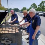 Seniors Ministry Picnic - Grilling hamburgers and hot dogs for Holy Name of Jesus Cathedral seniors.